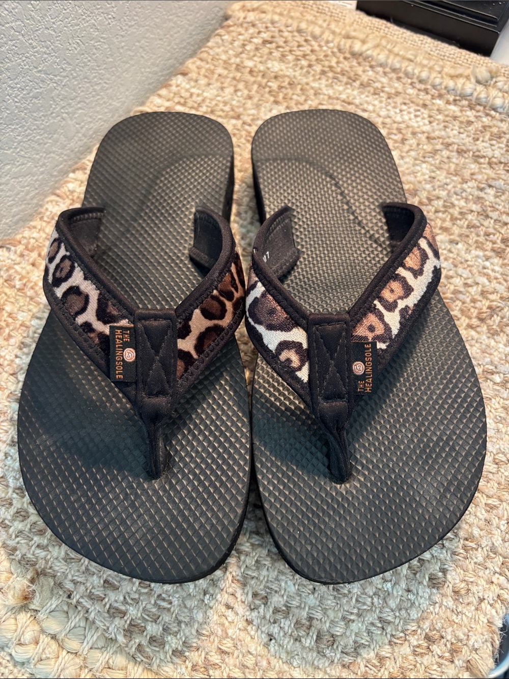 The Healing Sole Leopard Print Black Flip Flops